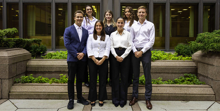 Group photo of the 2025 graduates outdoors.