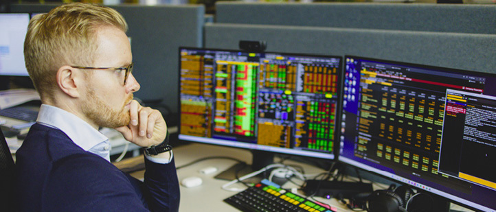 A man in a blue shirt is sitting at a desk with a computer monitor in front of him. He is using a keyboard and appears to be focused on the screen.

AI generated content